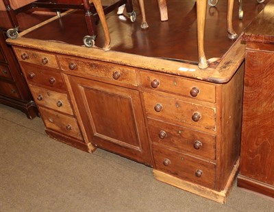 Lot 1301 - A late Victorian stained pine partners desk