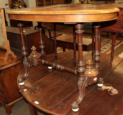 Lot 1312 - A Victorian walnut oval table