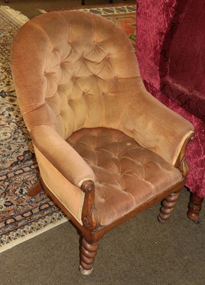 Lot 1330 - A Victorian button-back tub chair