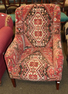 Lot 1339 - An early 20th century armchair covered in geometric pattern