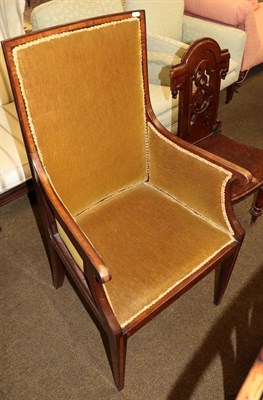 Lot 1343 - An Edwardian mahogany and satinwood banded armchair and a Victorian carved mahogany hall chair (2)