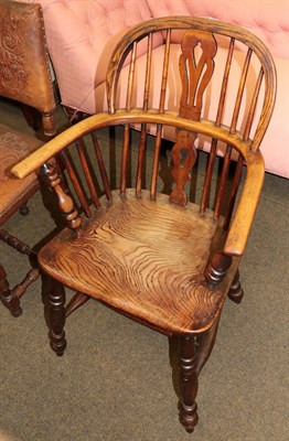 Lot 1345 - A 19th century ash and elm Windsor armchair