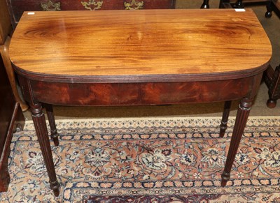 Lot 1348 - A Regency mahogany fold over table in the manner of Gillows