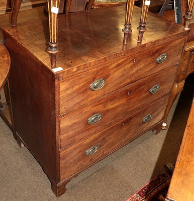 Lot 1353 - A George III mahogany three-height chest of drawers