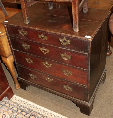 Lot 1356 - An 18th century oak four-height chest of drawers