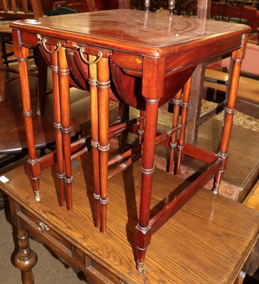 Lot 1360 - A nest of early 20th century tables