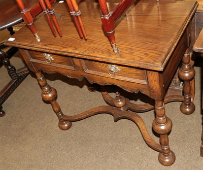 Lot 1361 - A reproduction oak side table in the 17th century style