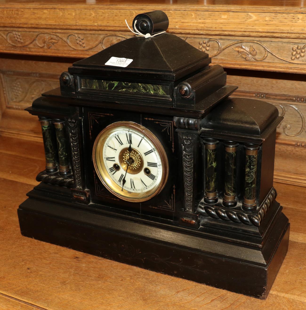 Lot 1364 - A Victorian ebonised architectural form striking mantel clock