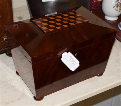 Lot 1366 - A late 19th century mahogany sarcophagus shaped tea caddy with parquetry decoration to cover