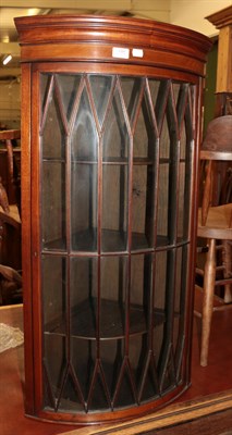 Lot 1391 - Inlaid mahogany bow front corner cabinet