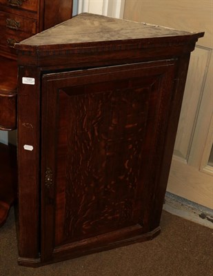 Lot 1393 - George III oak and mahogany cross banded corner cupboard and a mahogany dressing table mirror