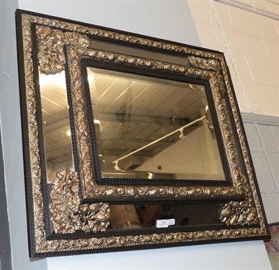 Lot 1400 - An 19th century ebonised bevel glass marginal mirror, 73cm by 86cm