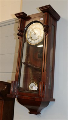 Lot 1403 - A walnut Vienna style striking wall clock