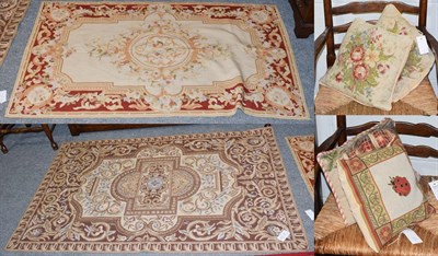 Lot 1095 - Chinese needlepoint rug, the cream field with central floral medallion framed by deep...