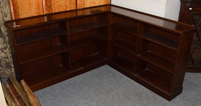 Lot 1189 - An inlaid mahogany low corner bookcase