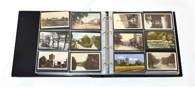 Lot 2399 - A full album of some 550 cards containing many street scenes and social history views including...