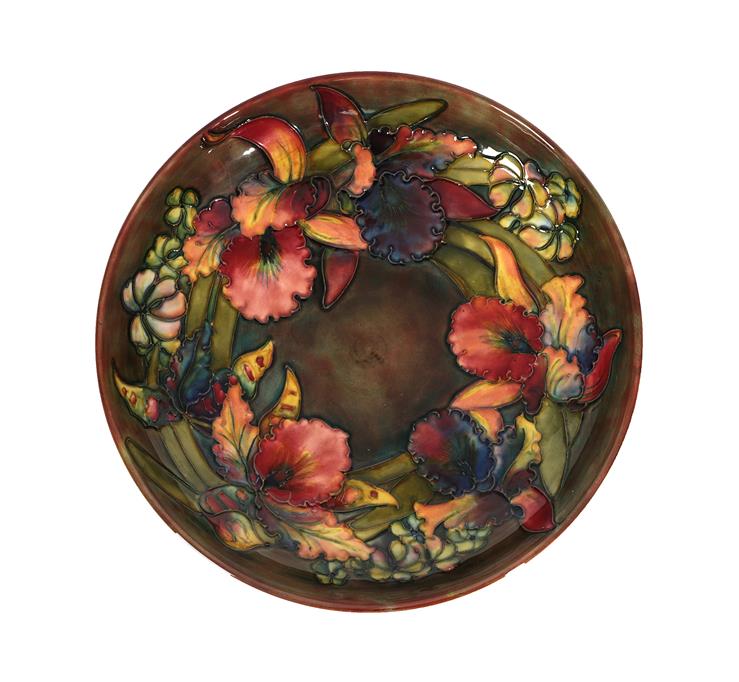 Lot 3 - Walter Moorcroft (1917-2002): An Flambé Orchid and Spring Flowers Pattern Footed Bowl,...