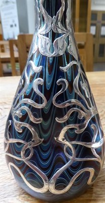 Lot 40 - An Art Nouveau Loetz Blue Iridescent Glass and Silver Mounted Vase, circa 1900, with applied...