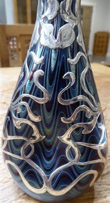 Lot 40 - An Art Nouveau Loetz Blue Iridescent Glass and Silver Mounted Vase, circa 1900, with applied...