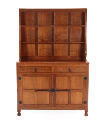 Lot 91 - Workshop of Robert Mouseman Thompson (Kilburn): An English Oak 4ft Welsh Dresser, the top with...
