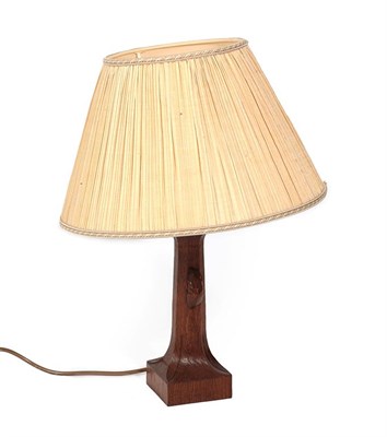 Lot 104 - Workshop of Robert Mouseman Thompson (Kilburn): An English Oak Table Lamp, post 1970's,...