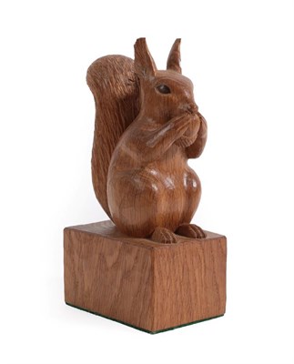 Lot 138 - Woodpeckerman: Stan Dodds (1928-2012): A Carved English Oak Squirrel, sitting up on it's...