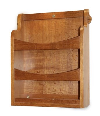 Lot 156 - Coxwold Cabinet Makers: An English Oak Wall Mounted Leaflet Holder, with shaped sides and two bars