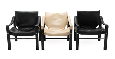 Lot 184 - A Pair of Arkana Safari Lounge Chairs, designed by Maurice Burke, black vinyl slung seats and...