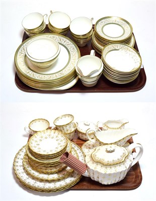 Lot 12 - A quantity of Spode and Minton Fleur de Lys Gold and Aragon pattern tea and dinner wares (qty)