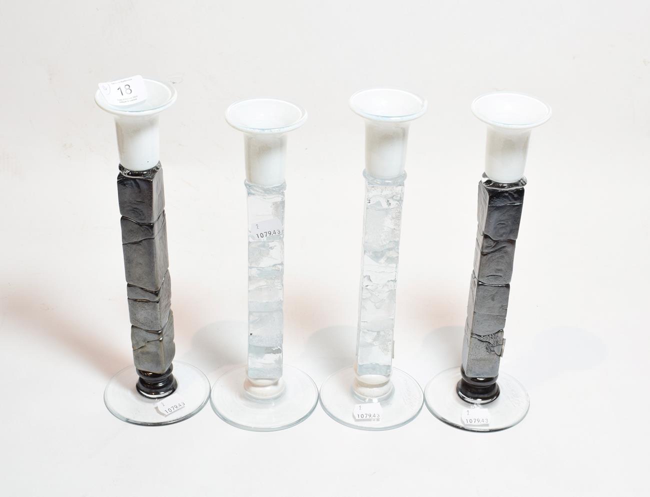 Lot 18 - Two pairs of Mihai Topescu glass candlesticks, signed with labels