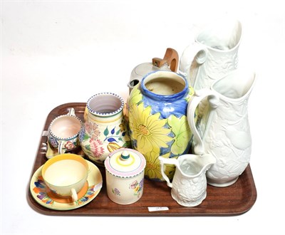 Lot 31 - A Clarice Cliff Bizarre ware crocus pattern tea cup and saucer; Portmerion jugs; Poole pottery;...