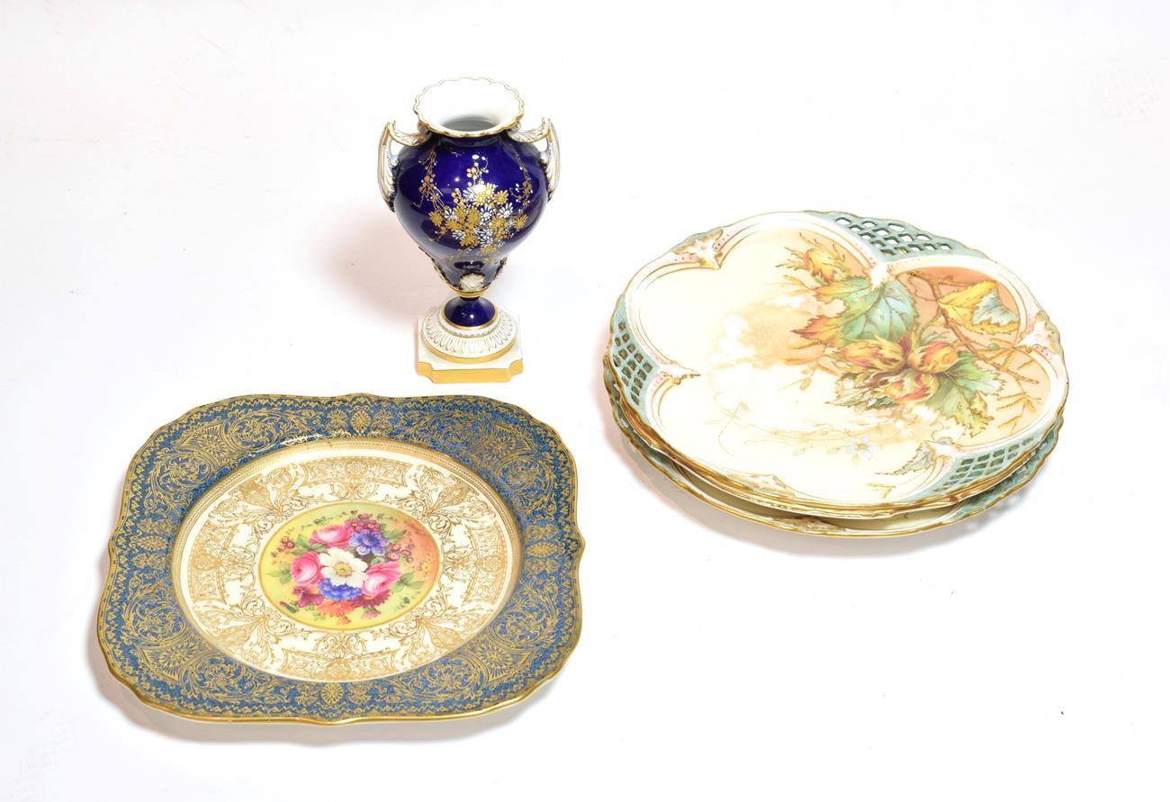 Lot 37 - A Royal Worcester floral painted gilt-highlight plate, signed E.Barker (a.f.); together with...