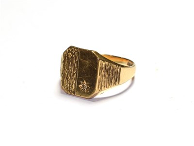 Lot 60 - A 9 carat gold diamond set signet ring, finger size T