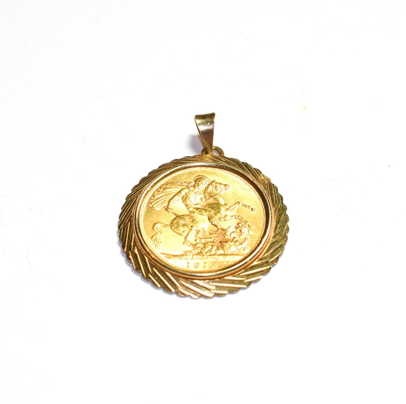 Lot 70 - A 1913 full sovereign mounted as a pendant, length 3.6cm
