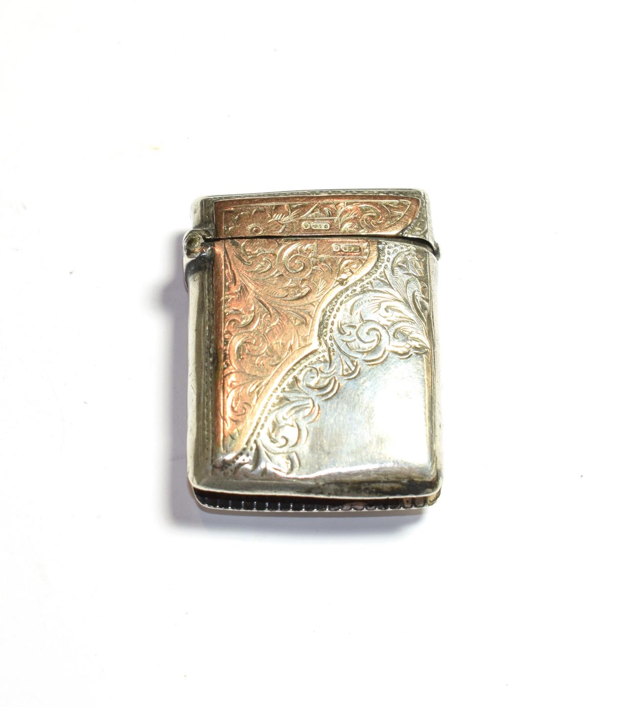 Lot 76 - An Edwardian silver vesta case, Birmingham, 1902, with 9 carat gold serpentine panel, stamped 9 375