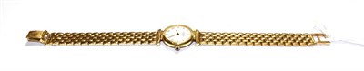 Lot 81 - A lady's 18 carat gold wristwatch, signed Raymond Weil, Geneve, circa 2000, quartz movement,...
