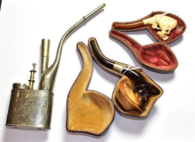 Lot 83 - Two cased Meerschaum pipes and an opium pipe (3)