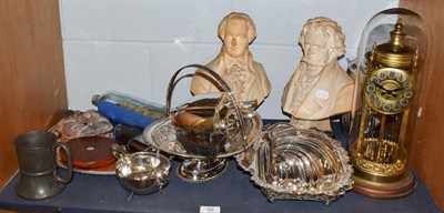 Lot 92 - A selection of silver plated ware, anniversary glass domed mantel timepiece, pair of busts of...