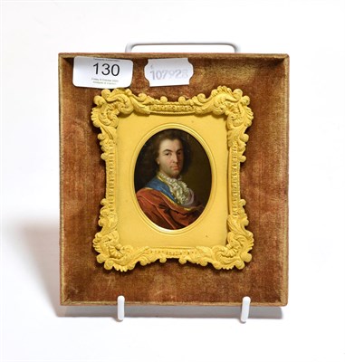Lot 130 - A 19th century portrait miniature of a gentleman in a red coat with white cravat