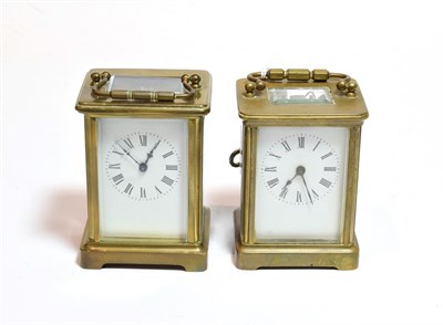 Lot 135 - Two brass carriage timepieces, circa 1910, with enamel dials