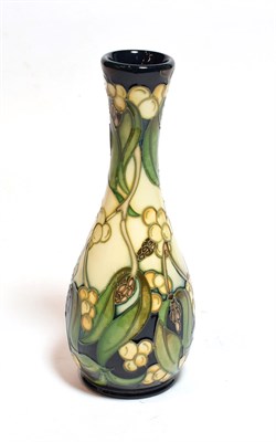 Lot 138 - A Moorcroft pottery ''Mistletoe'' pattern vase by Rachel Bishop, 21cm high
