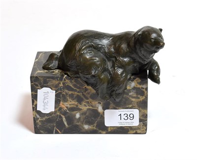 Lot 139 - A 20th century bronze bear with foundry mark, modelled on a marble plinth base, 13cm high