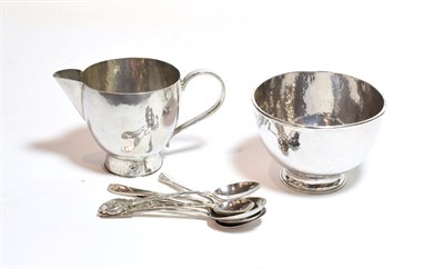Lot 140 - A 20th century planished silver sugar bowl and cream jug, by MESA, London, with six various...