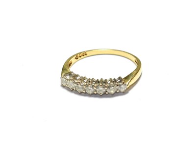 Lot 160 - An 18 carat gold diamond seven stone ring, finger size O