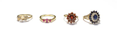 Lot 178 - A sapphire and diamond cluster ring, stamped '9K', finger size P; a 9 carat gold garnet cluster...