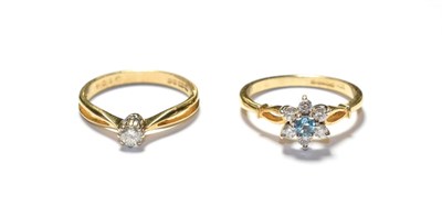 Lot 179 - A 9 carat gold diamond solitaire ring, finger size N; and a 9 carat gold diamond and blue...