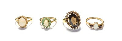 Lot 194 - A 9 carat gold opal ring, finger size M1/2; a 9 carat gold opal and emerald cluster ring,...
