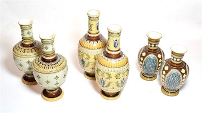 Lot 196 - Mettlach comprising three pairs of traditional style vases, impressed marks to base, the...