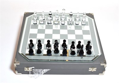 Lot 210 - A silver crystal Swarovski chess set, boxed