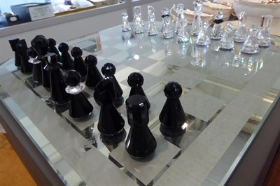 Lot 210 - A silver crystal Swarovski chess set, boxed